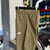 NIKE UNLINED CUFF PANTS